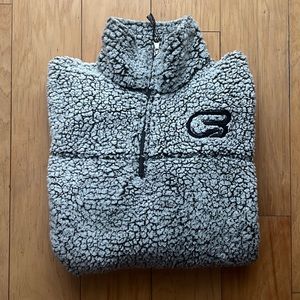 Cyclebar- branded black and white Sherpa, size small.